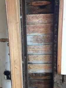 Photo1-A-section-of-newer-clapboard-viewed-from-inside-the-house-scaled-e1597031316922-225x300