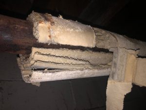 Asbestos-wrapped pipes